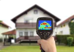 Thermal gun pointed at a house